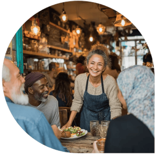 Local cafe owner talking with customers