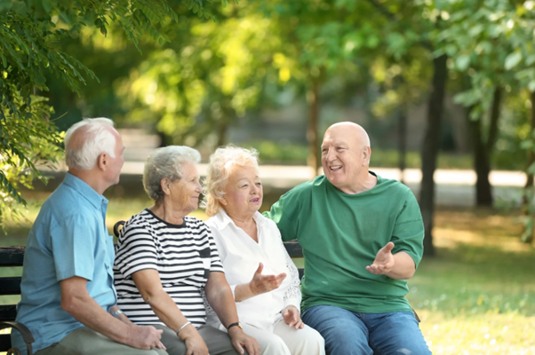 Elderly couple outdoors representing do pensioners pay council tax and financial support options for retirees.