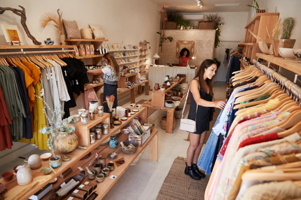 Local business shop attracting customers with clothing, homeware and lifestyle products displayed throughout the store.